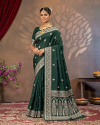Dark green Mashru silk saree by Kalisa Banaras with intricate gold zari work and traditional drape design.