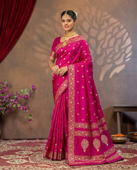 Pink Mashru silk saree by Kalisa Banaras featuring traditional weaving and intricate patterns on smooth, luxurious fabric.