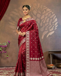Red Mashru silk saree by Kalisa Banaras featuring traditional woven patterns and a rich, vibrant red color.