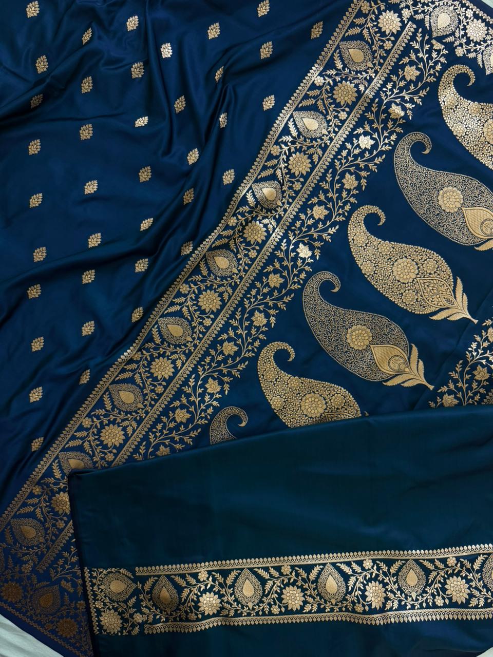 Elegant Banarasi Mashru silk saree by Kalisa Banaras with intricate gold zari work and traditional design, draped beautifully.
