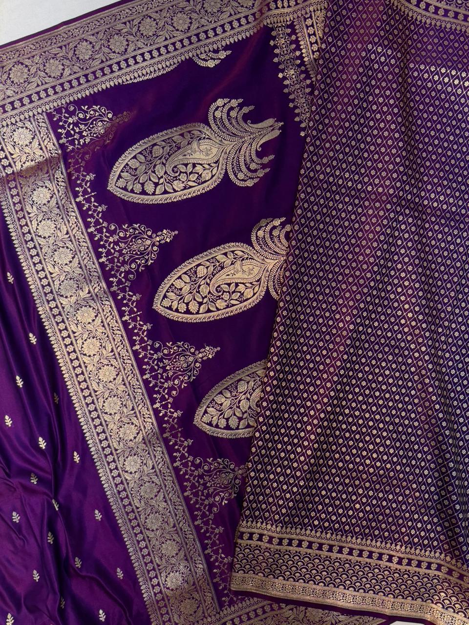 Purple Mashru silk saree by Kalisa Banaras with intricate gold zari work and traditional drape, displayed on a hanger.