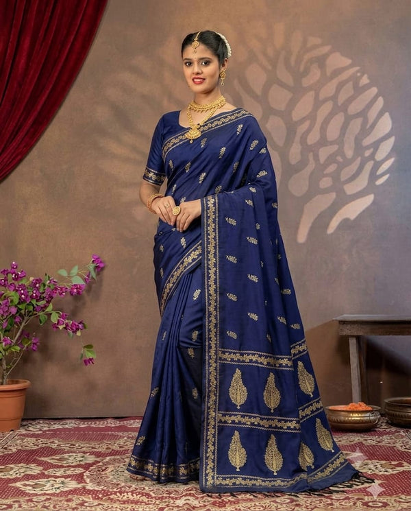 Navy blue Mashru silk saree with intricate patterns, traditional design, and elegant drape from Kalisa Banaras.
