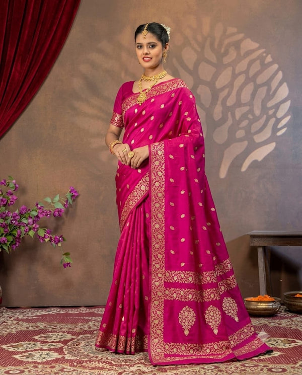 Pink Mashru silk saree by Kalisa Banaras featuring traditional weaving and intricate patterns on smooth, luxurious fabric.