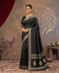 Black Mashru silk saree with Mina buti embroidery by Kalisa Banaras, showcasing intricate patterns and rich fabric.